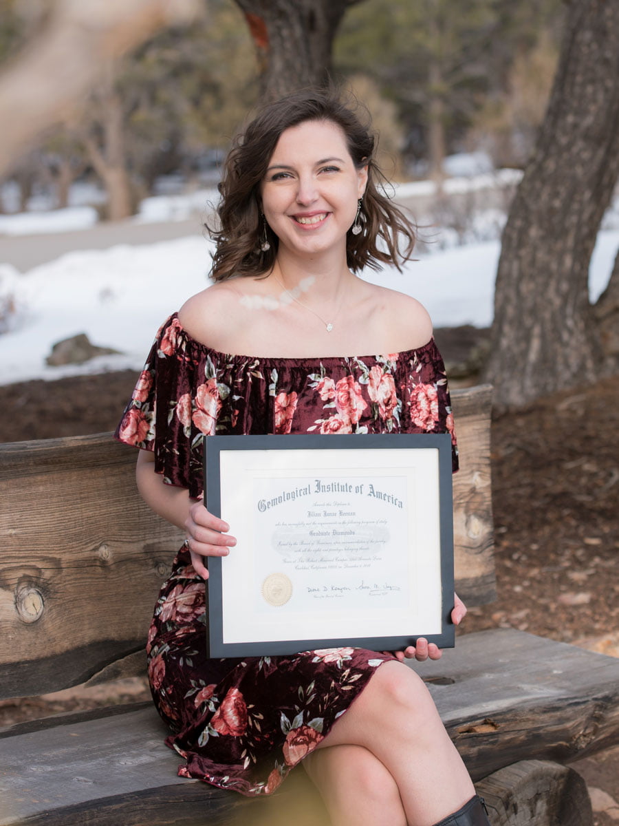 Jilian holding her diploma